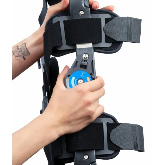 Orteză de genunchi mobilă, telescopică, cu articulații reglabile