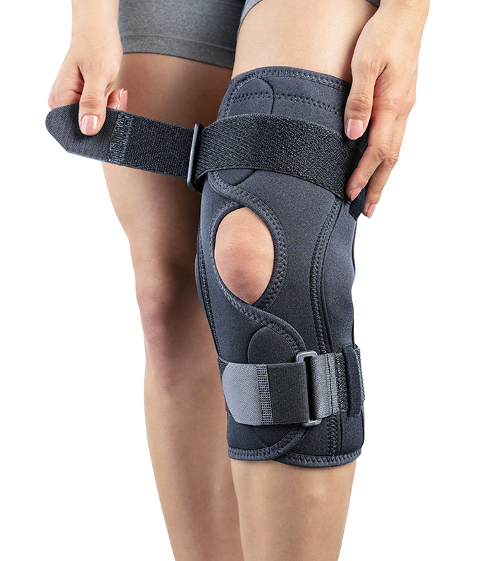 Orteză de genunchi mobilă cu articulaţii laterale